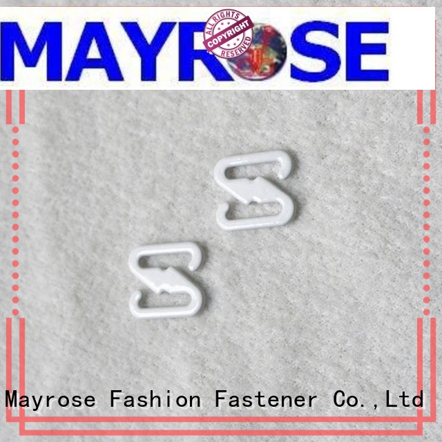 Mayrose cut bra hook and eye fasteners with silver plating under sweater-dress
